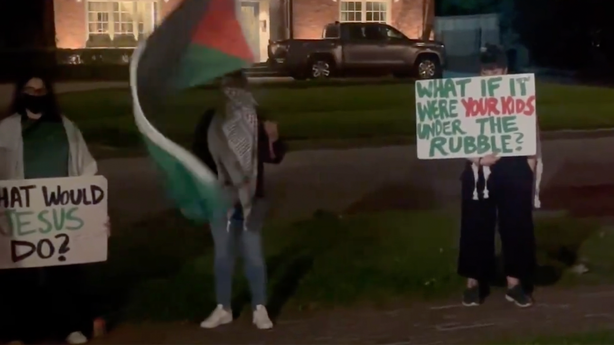 Protester outside Sen. Cruz's home