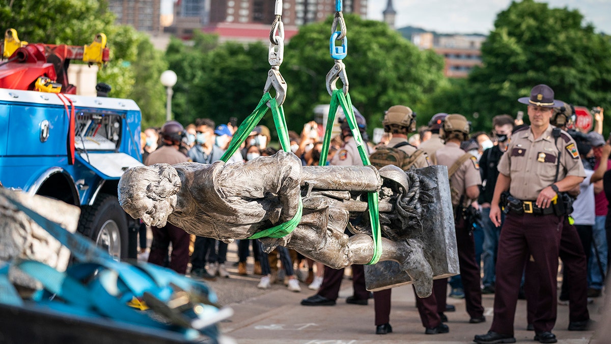 A statue being removed