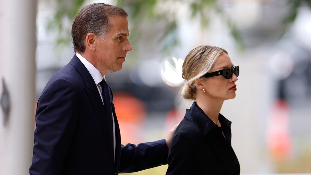 Hunter Biden and his wife Melissa Cohen Biden arrive at federal court.