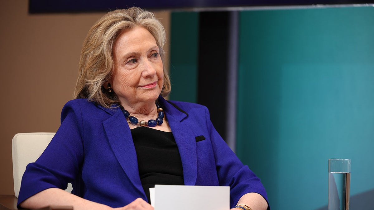 Hillary Clinton sits on stage at Vital Voices event in DC