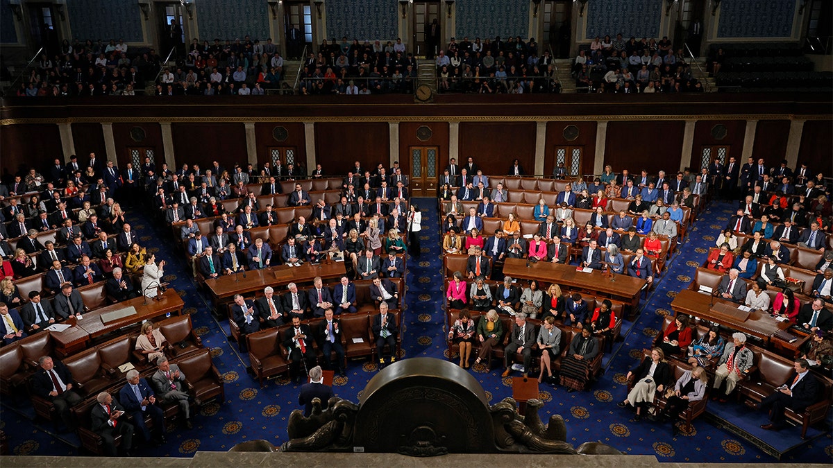 shot of representatives seated in House chamber 