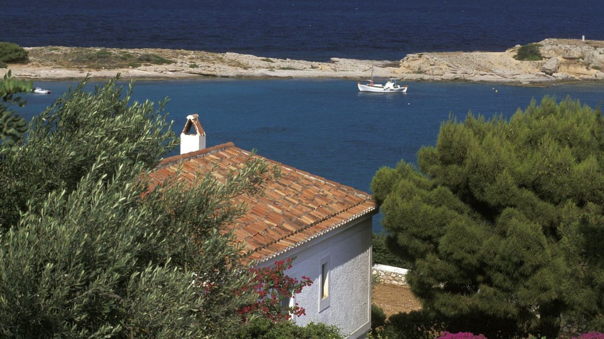 Aerial view of Greek house and waters