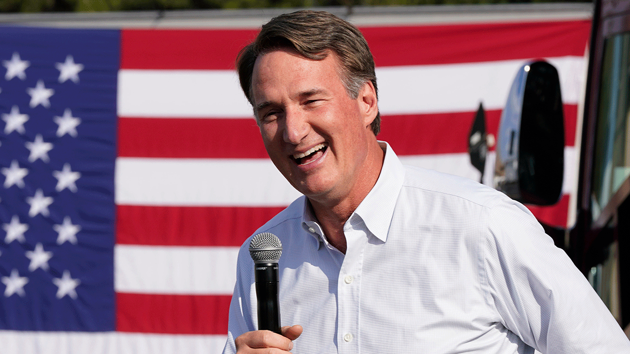 Gov. Glenn Youngkin with US flag in background