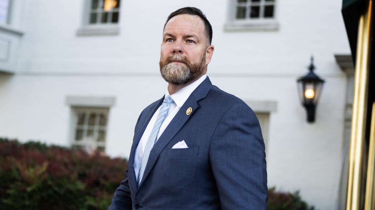 Rep. Aaron Bean, R-Fla., leaves a meeting of the House Republican Conference.