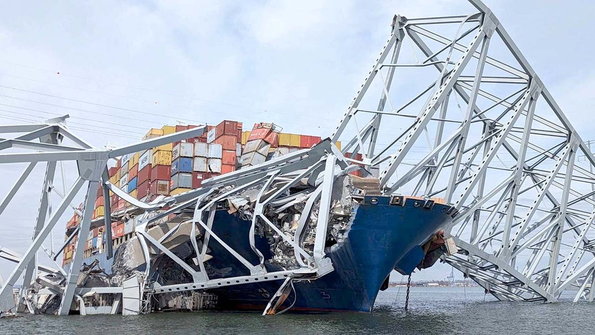 Francis Scott Key Bridge is suspended on the container ship Dali in Baltimore, Maryland, U.S., March 26, 2024. U.S.