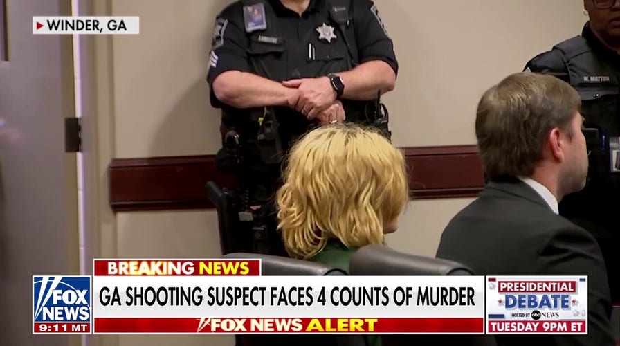 Georgia shooting suspect and father appear in court