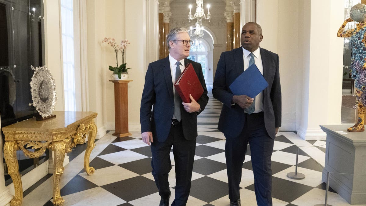 British PM Starmer, left with UK foreign minister David Lammy