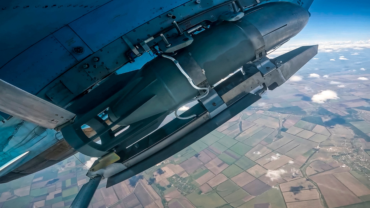 Glide bomb seen as plane flies over field