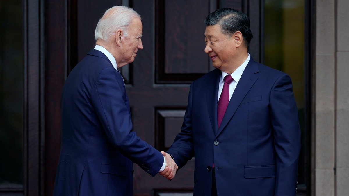 President Joe Biden greets China's President President Xi Jinping