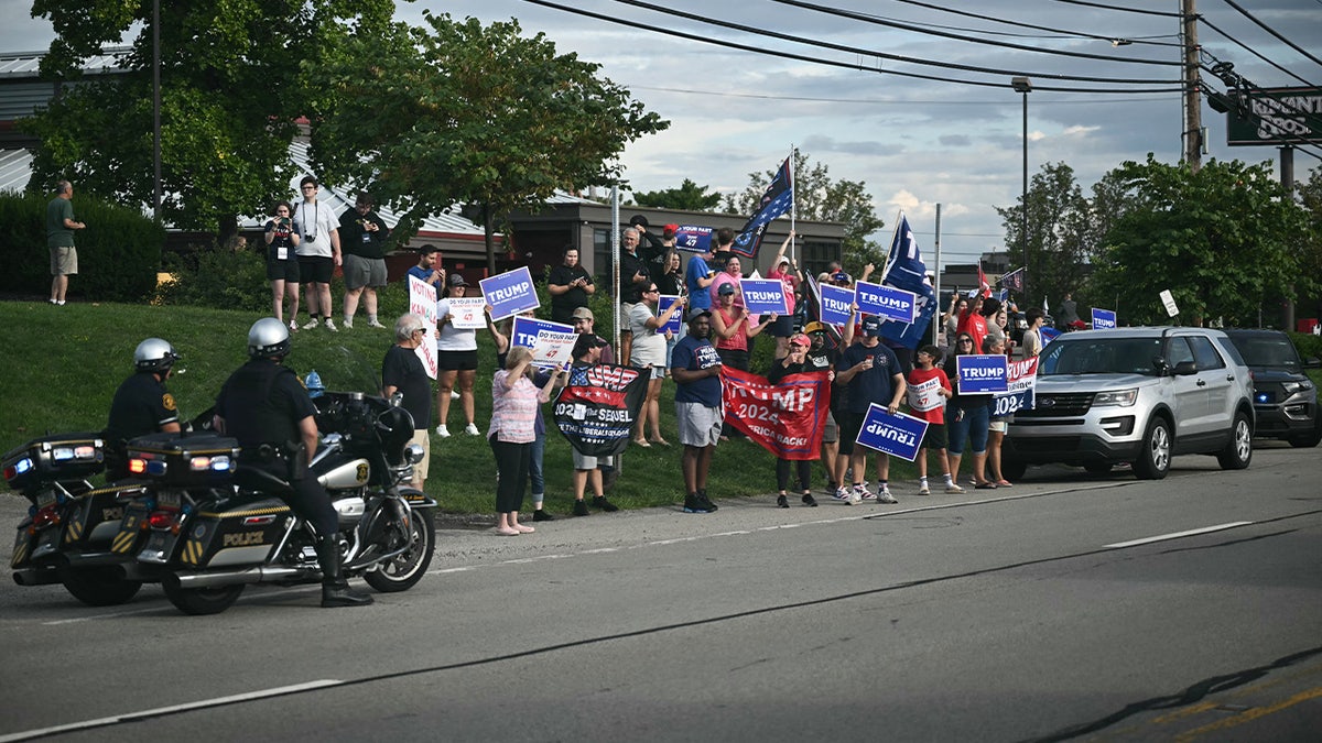 Trump supporters outside a Kamala Harris event