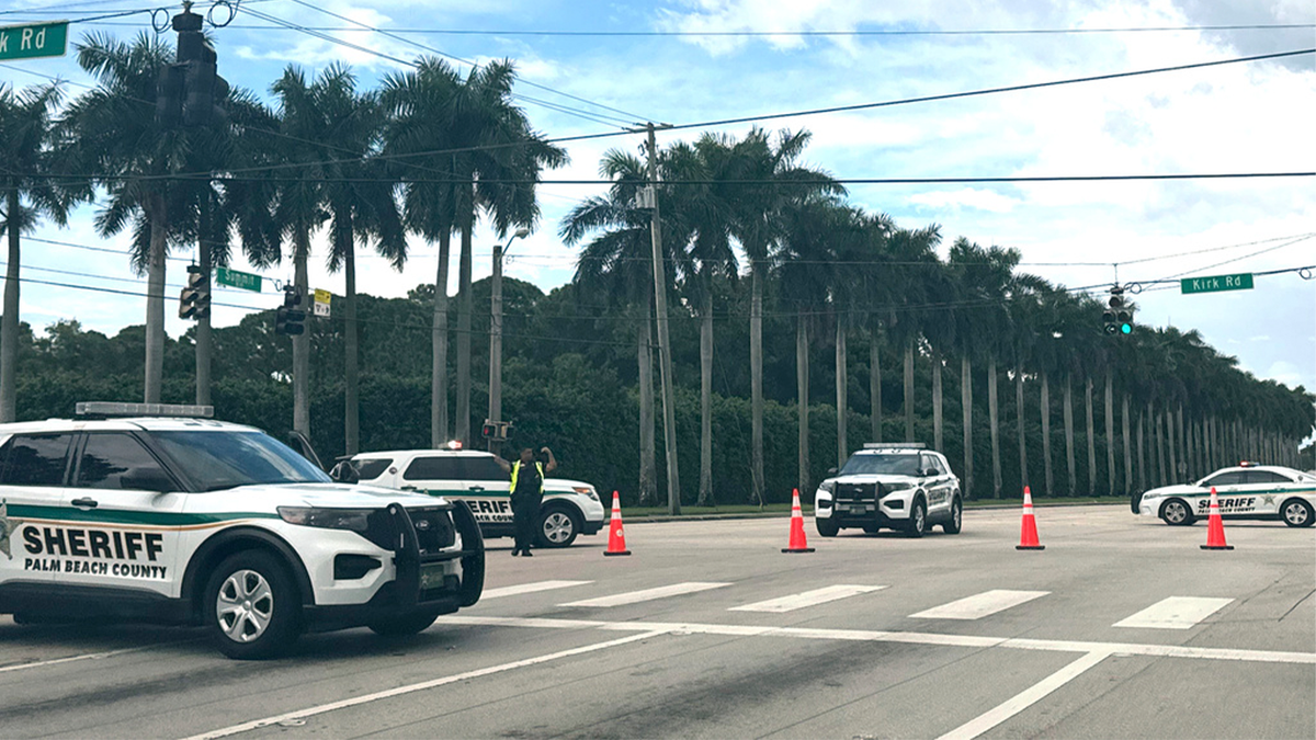 Sheriff vehicles are pictured near Trump International Golf Club, Sunday. Sept. 15, 2024, in West Palm Beach, Fla., after gunshots were reported in the vicinity of Republican presidential candidate former President Donald Trump.