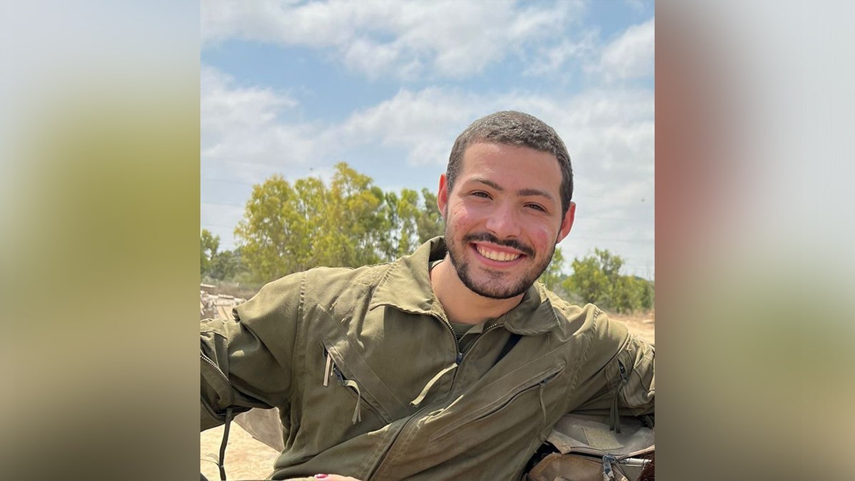 Itay seen smiling while wearing an IDF uniform