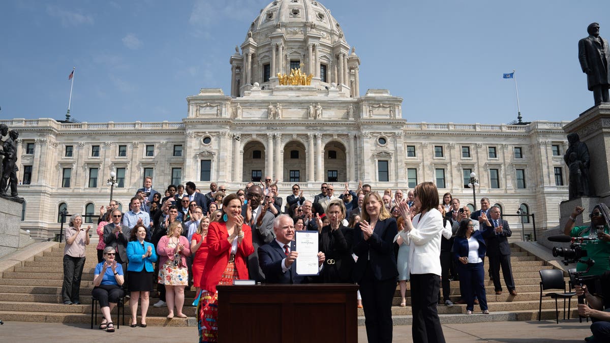 Minnesota Gov. Tim Walz threw a ceremonial budget bill-signing party in 2023 on the state Capitol steps. Walz boasted about the accomplishments in the nearly $72 billion budget made possible by the Democrats' control of the state legislature and governor's office.