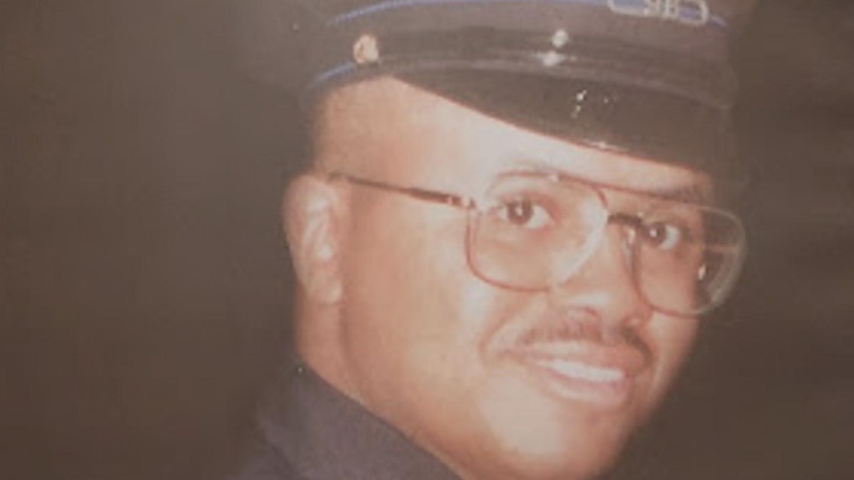 A close-up of Michael Beverly in his police uniform