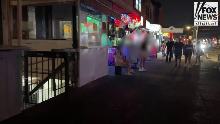 New York City street lined with prostitutes soliciting sex