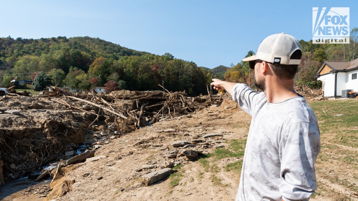 Jesse Craig points toward debris in "Craigtown"