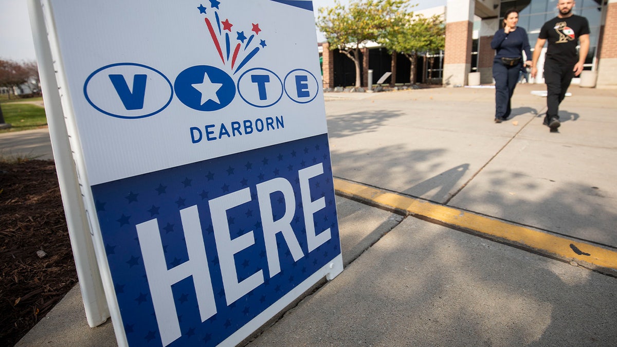 A man enters a polling location