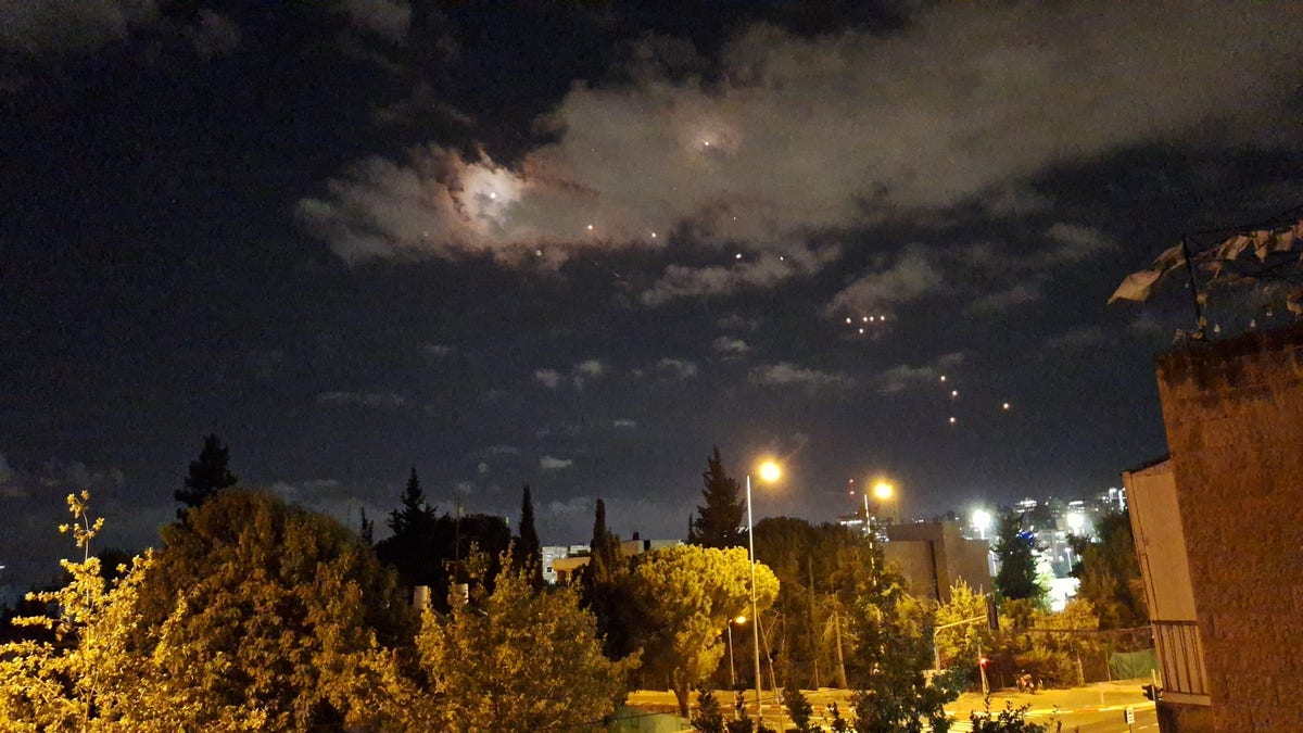 Residents of Jerusalem take shelter during an Iranian missile barrage on Oct. 1, 2024