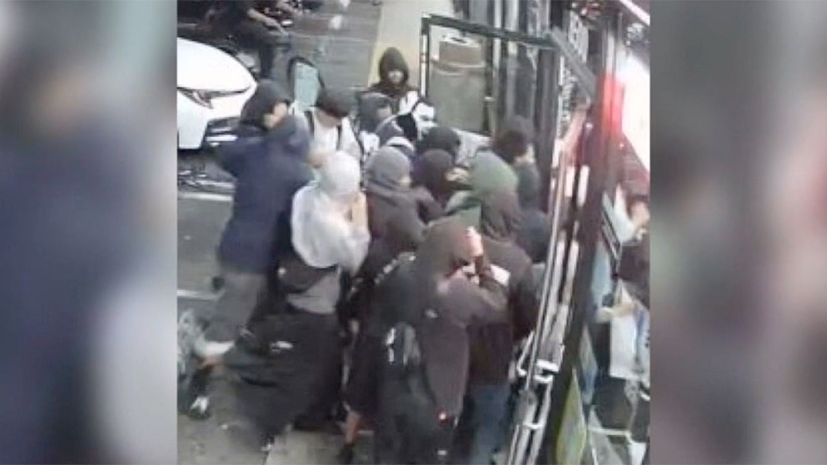 Group of teens outside LA convenience store