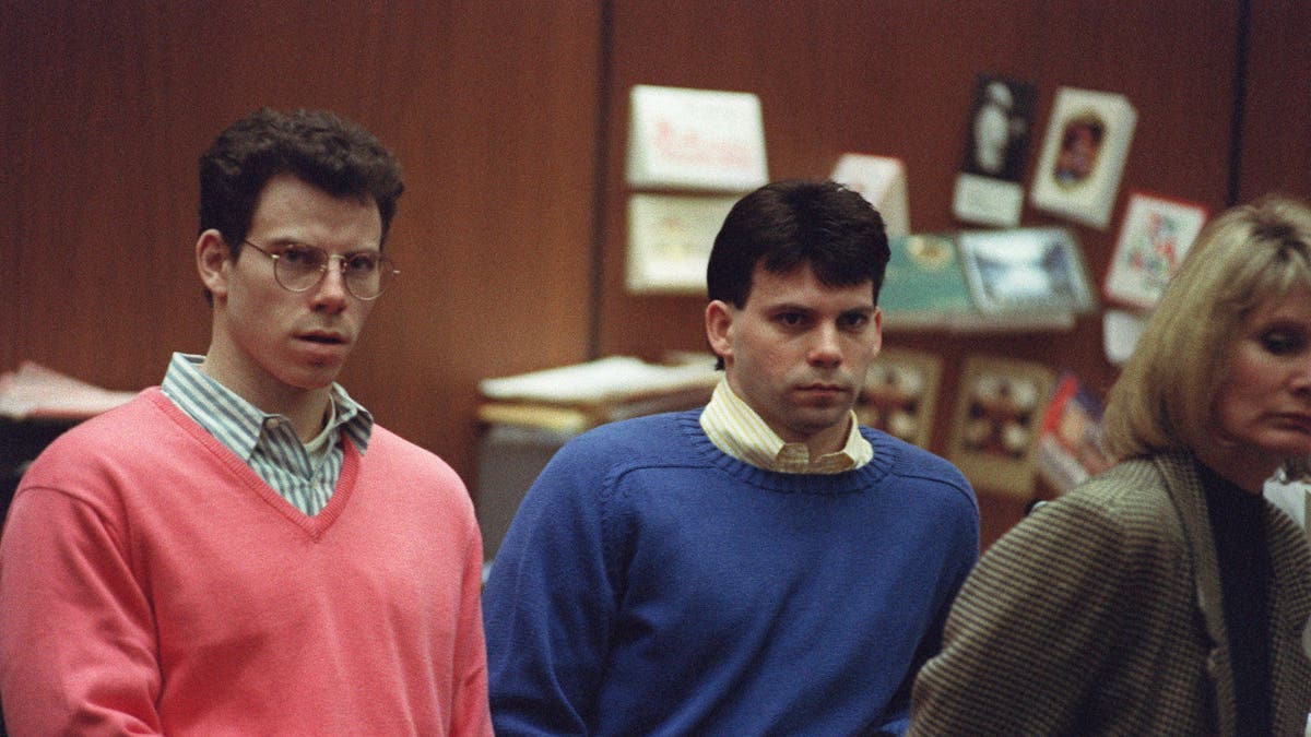 Erik Menendez (L) and his brother Lyle (R) listen during a pre-trial hearing