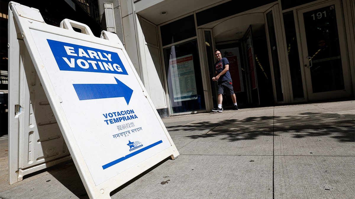 A man walks out of the Board of Elections Loop Super Site after casting his ballot in the 2024 presidential election on the second day of early voting in Chicago on Oct. 4, 2024.