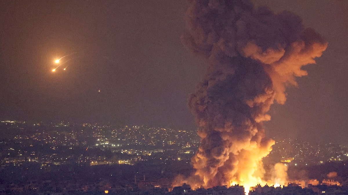 Smoke and flames rise in Beirut's southern suburbs, after Israeli air strikes, amid ongoing hostilities between Hezbollah and Israeli forces, as seen from Sin El Fil, Lebanon, Oct. 6, 2024.