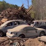 North Carolina man sleeping in tent after Hurricane Helene had to rebury father’s casket on property