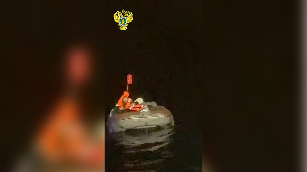 Russian man adrift at sea flags down rescuers from his inflatable boat