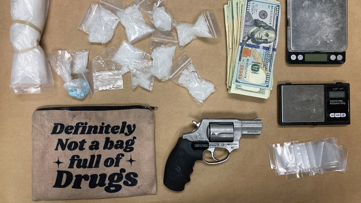 Drug, scale and gun