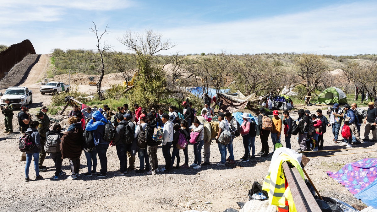 Migrants at the border in AZ