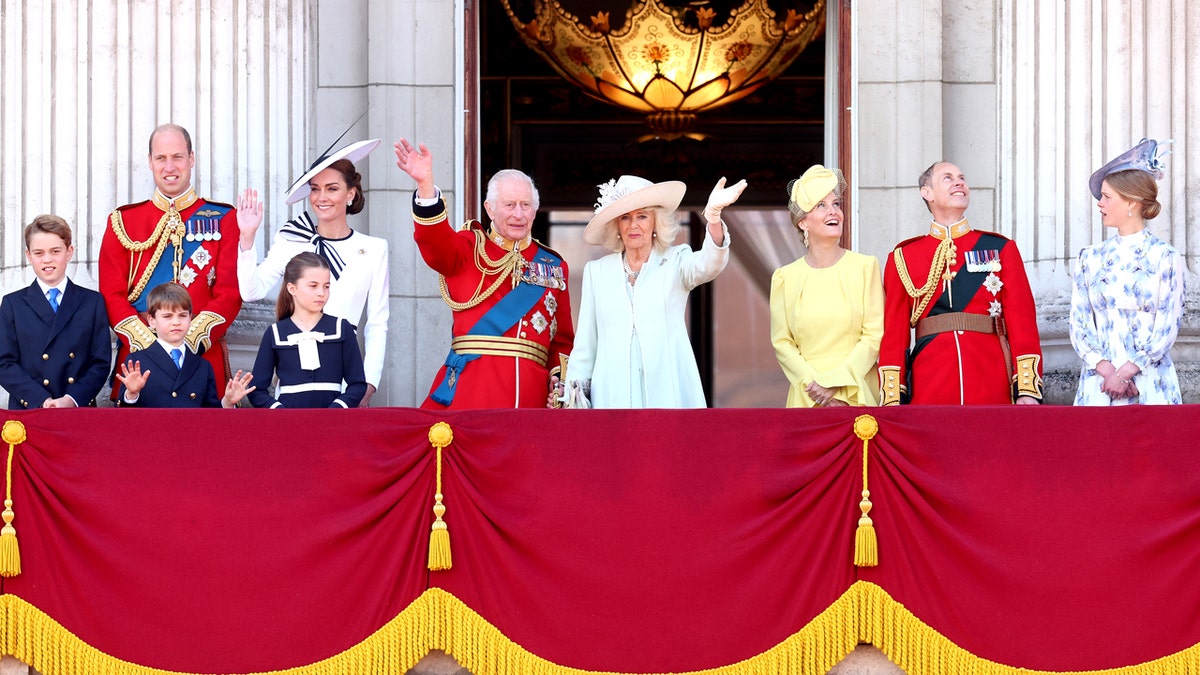 Royal family waving from balcony