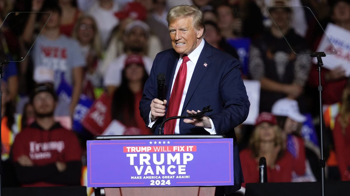 former President Trump on stage at rally