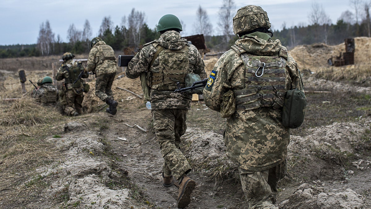 Battalion 120 Territorial Defense takes part in training exercises near the Belarus border as the war between Russia and Ukraine has been going on for the last two years in Chernobyl, Ukraine, on March 16, 2024.