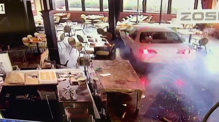 Car drives through Georgia restaurant's windows, sending customers running