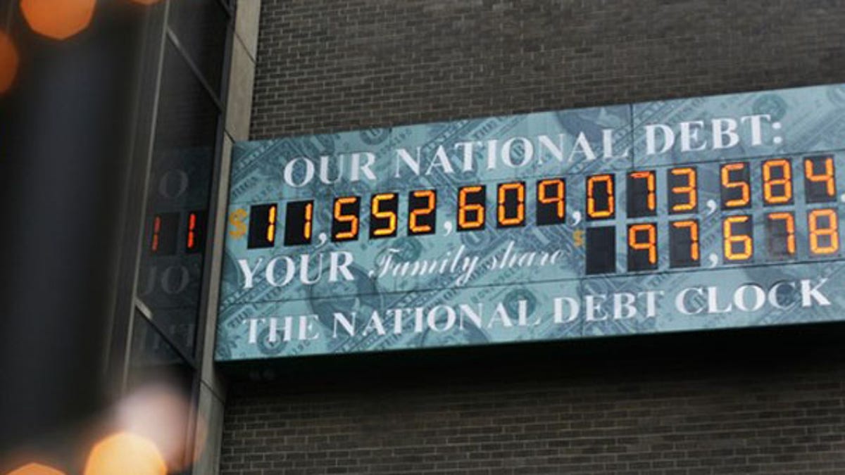 The National Debt Clock, which shows the U.S. national debt, is seen in New York City Aug. 24. That number has since surpassed $12 trillion. (Reuters Photo)