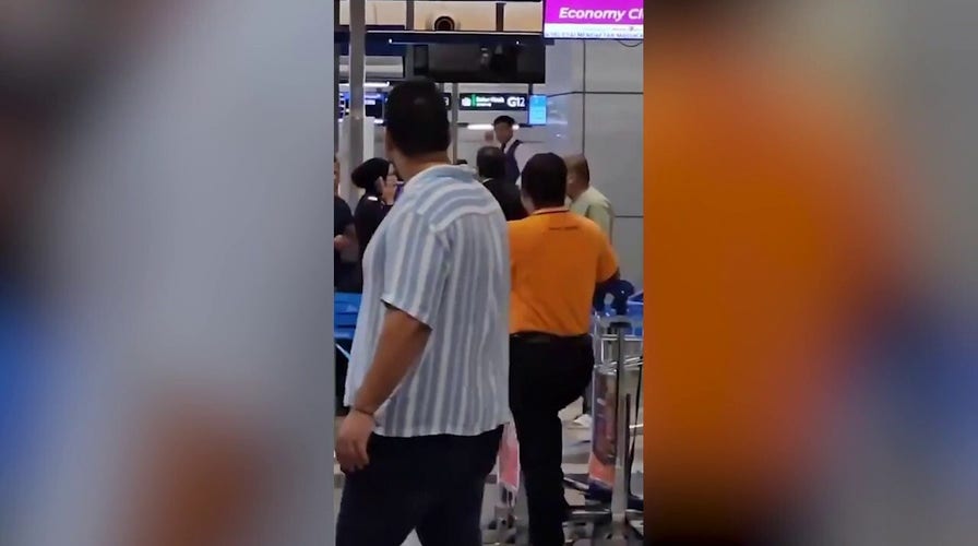 Fists fly as enraged passenger unloads punches on airport worker