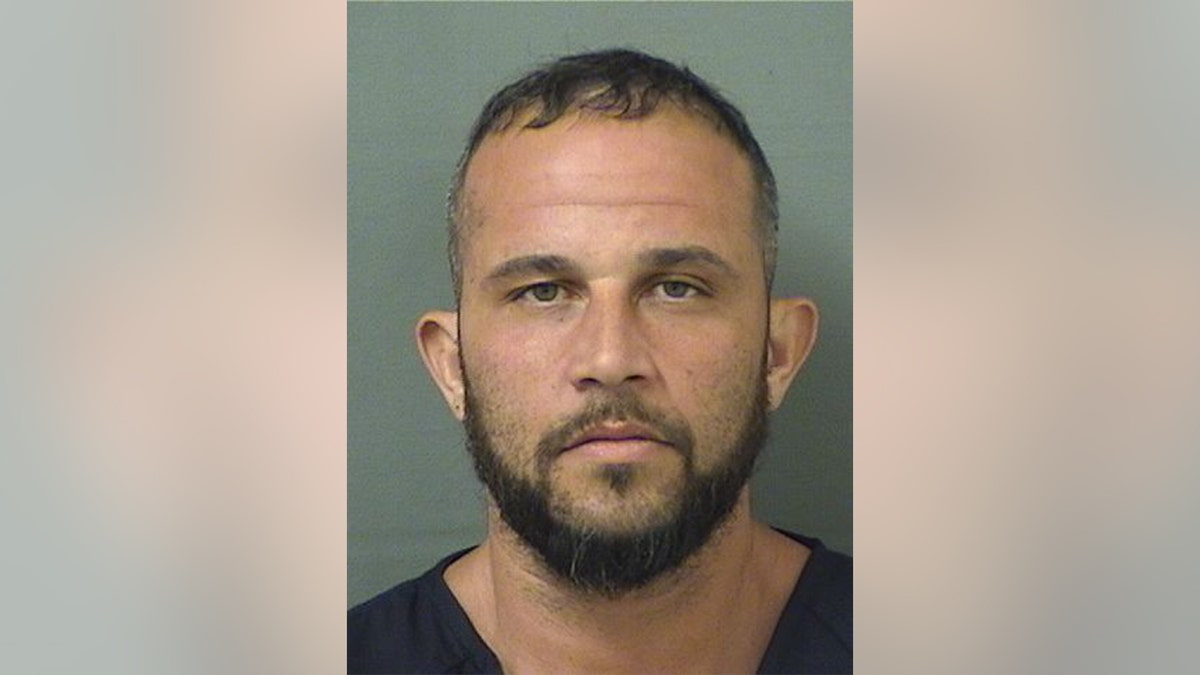 Florida man Junior Boucher is seen in a mugshot.