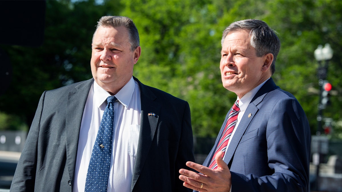 Sens. Jon Tester, D-Mont., left, and Steve Daines, R-Mont., outside of the Dirksen Building on Tuesday, April 27, 2021.