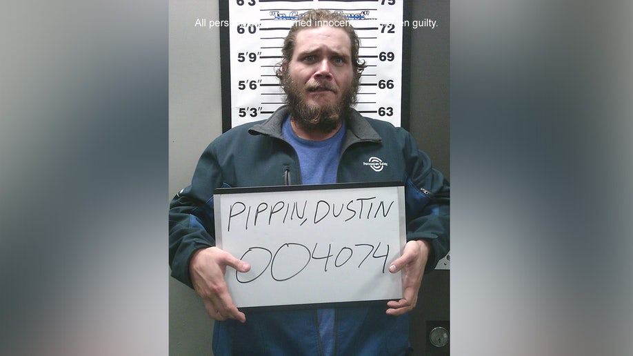 A mugshot of Dustin Pippin