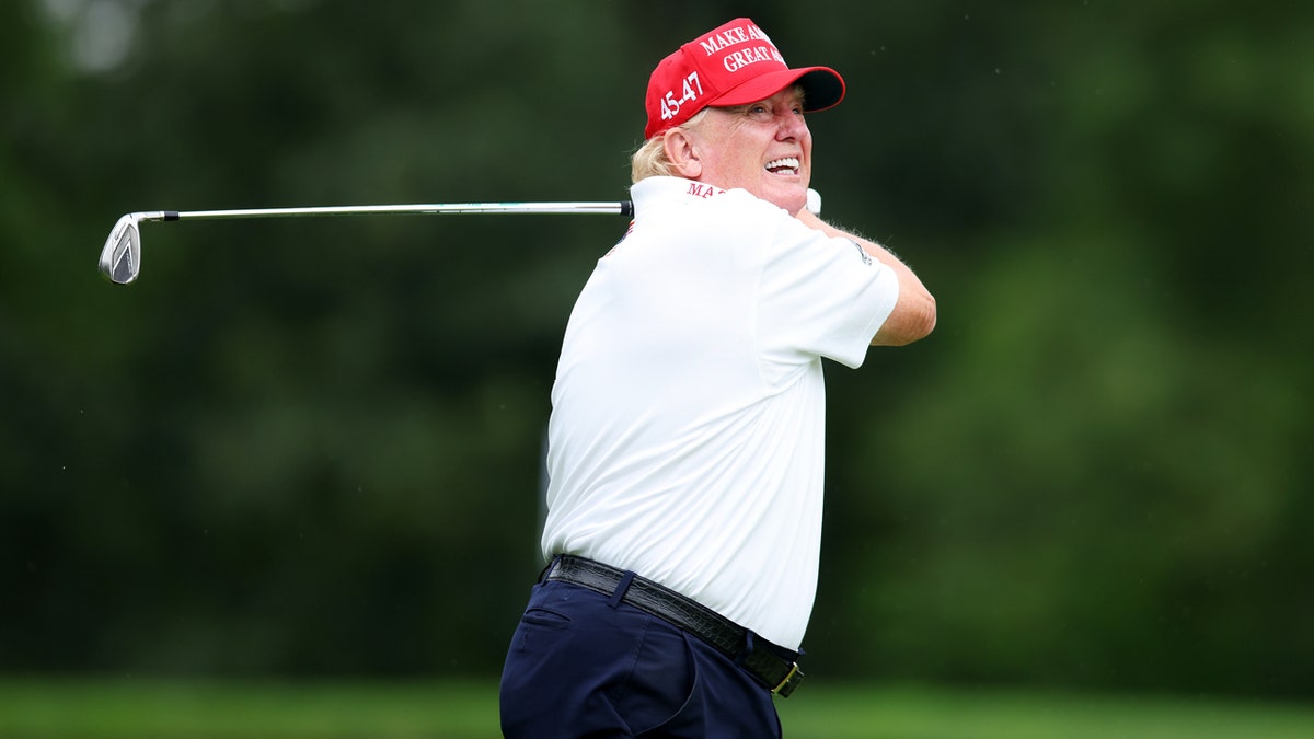 Donald Trump playing golf