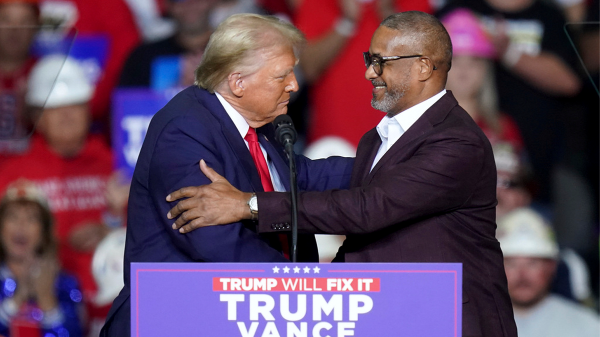 Roberto Clemente Jr. and Donald Trump at a rally