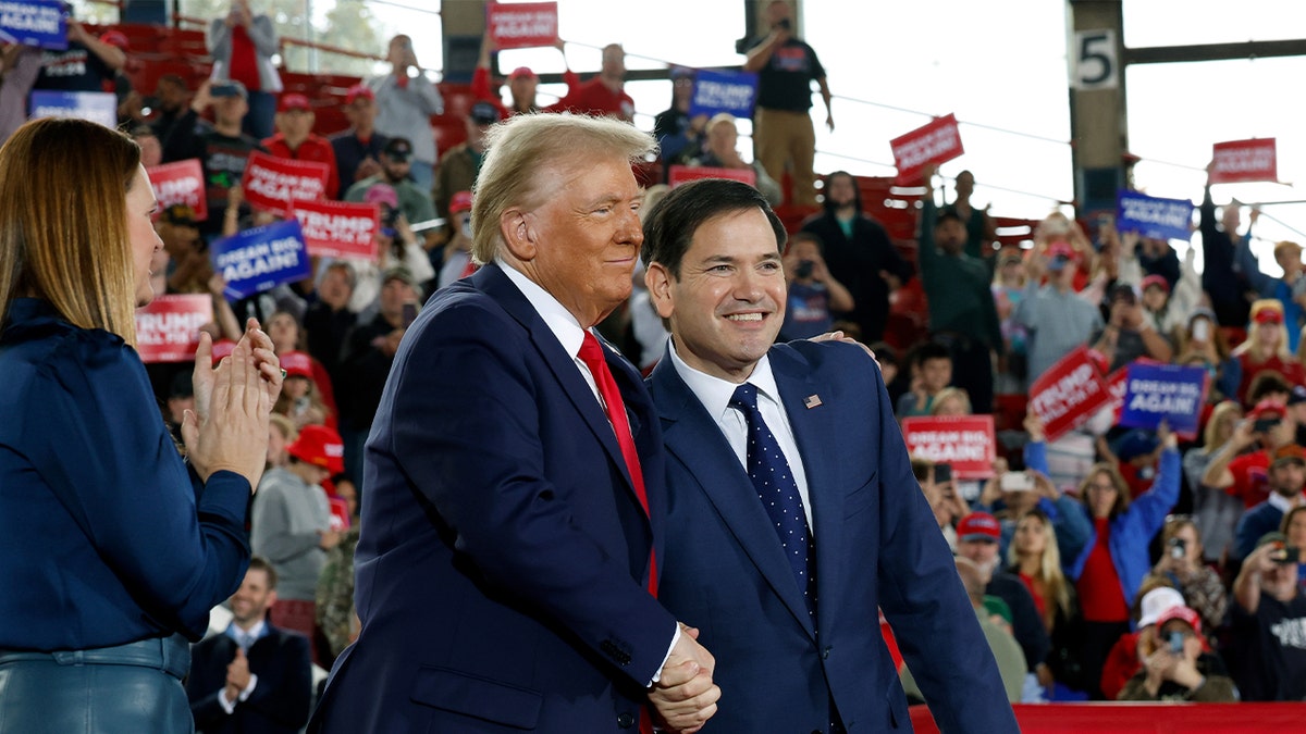 Trump and Sen. Marco Rubio shaking hands