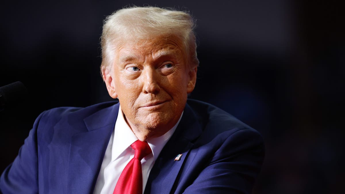 Donald Trump wearing a red tie