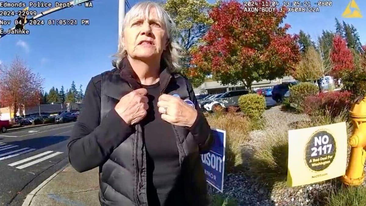 The woman allegedly confronted two Trump supporters based on their skin color, police said.