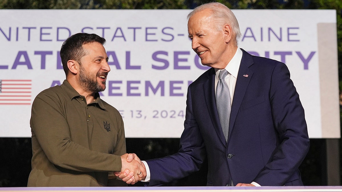 Zelenskyy and Biden shake hands