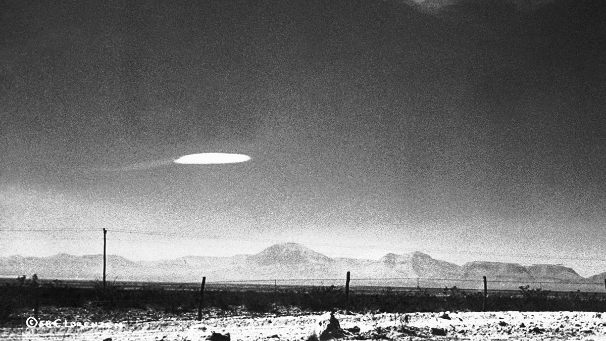 This UFO was photographed when it hovered for 15 minutes near the Holloman Air Development Center in Alamogordo, N.M., on Dec. 16, 1957.