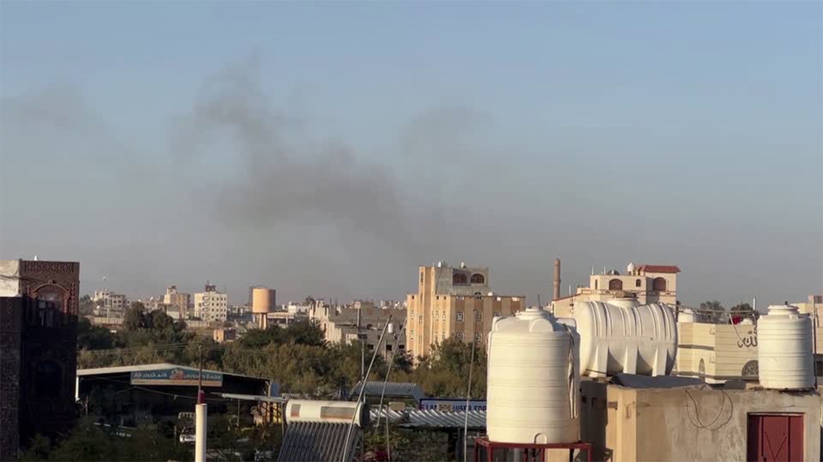 Smoke rises from Sana'a Airport in Yemen following reported Israeli airstrikes in the area