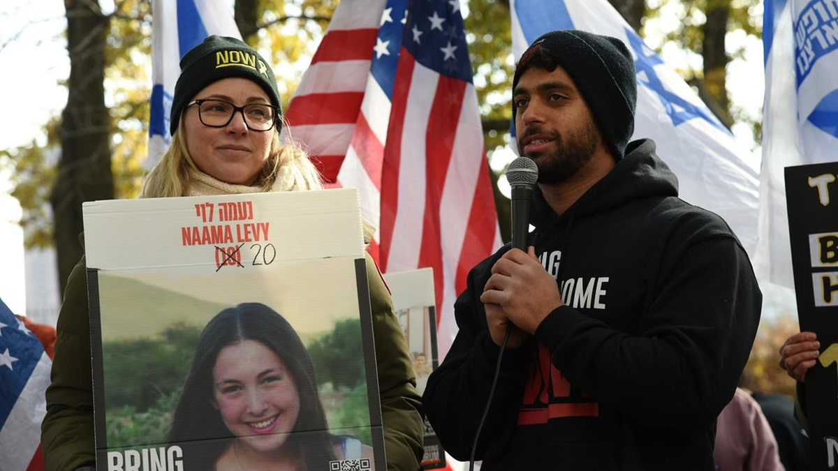 Hostage sign NYC Central Park protest