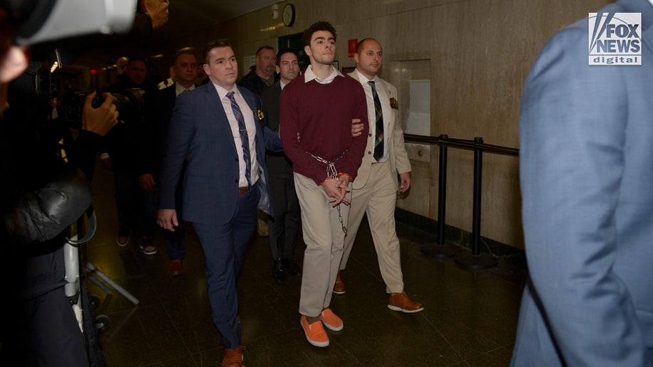 Luigi Mangione enters the courtroom in New York City Criminal Court