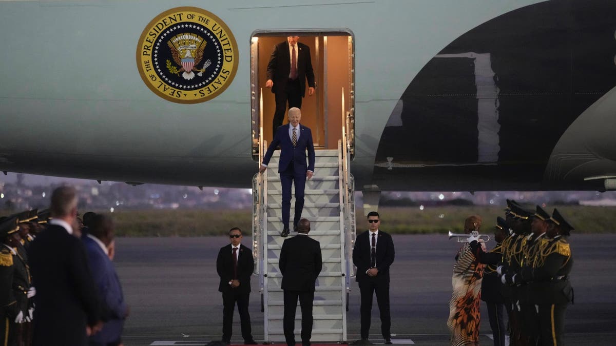 President Biden walks from Air Force One as he arrives at Quatro de Fevereiro International Airport in Luanda, Angola on Monday, Dec. 2, 2024 on his long-promised visit to Africa.